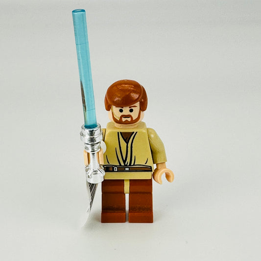 sw0152: Obi-Wan Kenobi - light nougat, dark orange hair and legs, gold headset (with crome lightsaber)